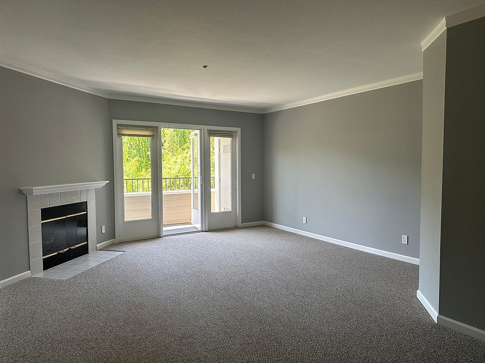 Living room, fireplace, balcony