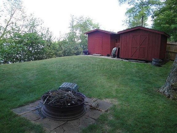 firepit and 2 sheds