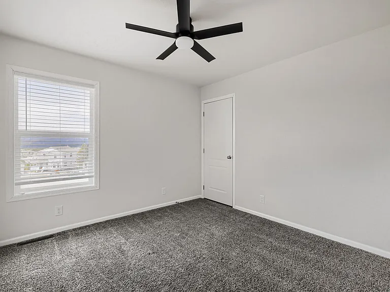 Bedroom 2 with ceiling fan