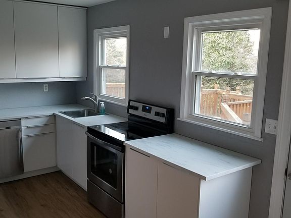 Freshly remodeled kitchen with brand new appliances and exit