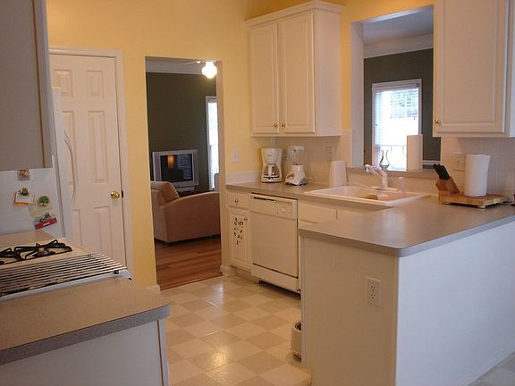 Large kitchen with lots of counter space and storage. 2 pantries available for