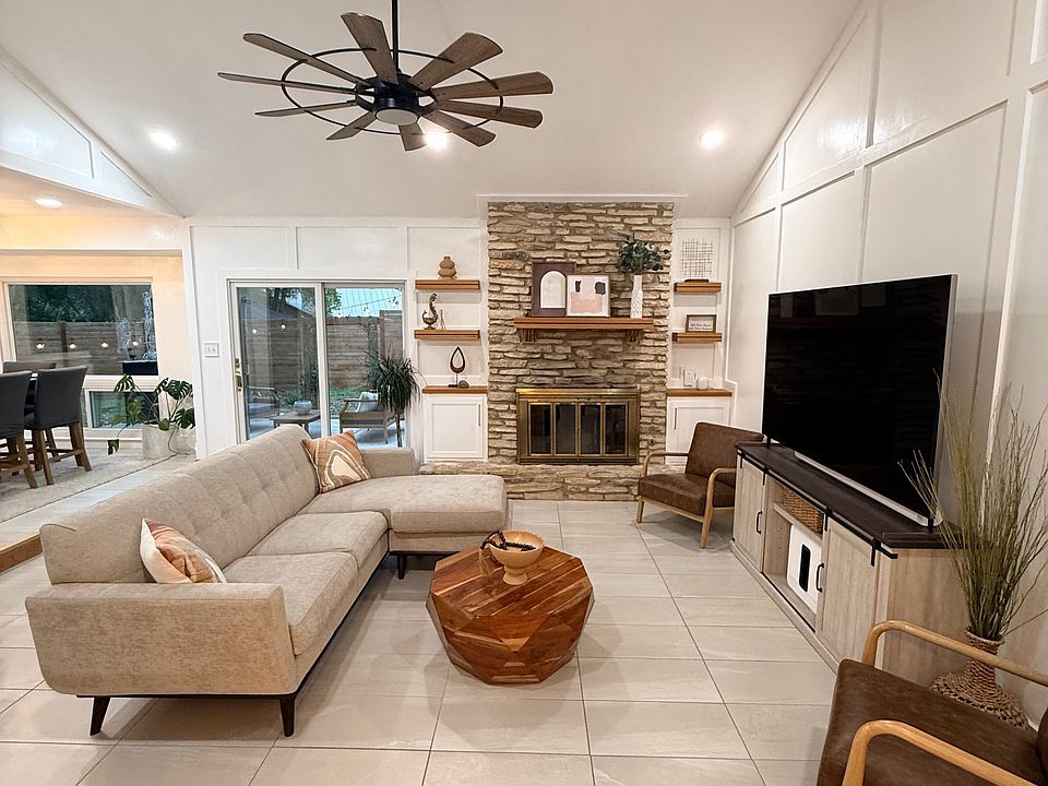Living room with high ceiling.