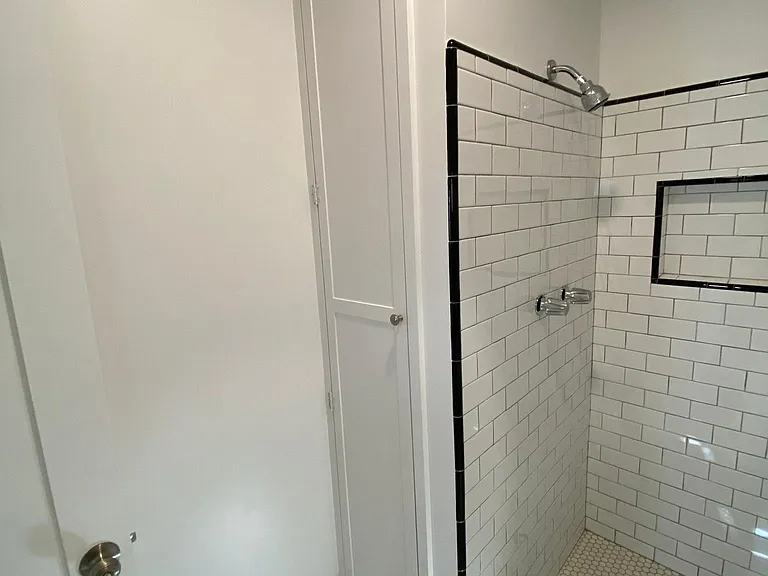 SHOWER AND STORAGE CABINET
