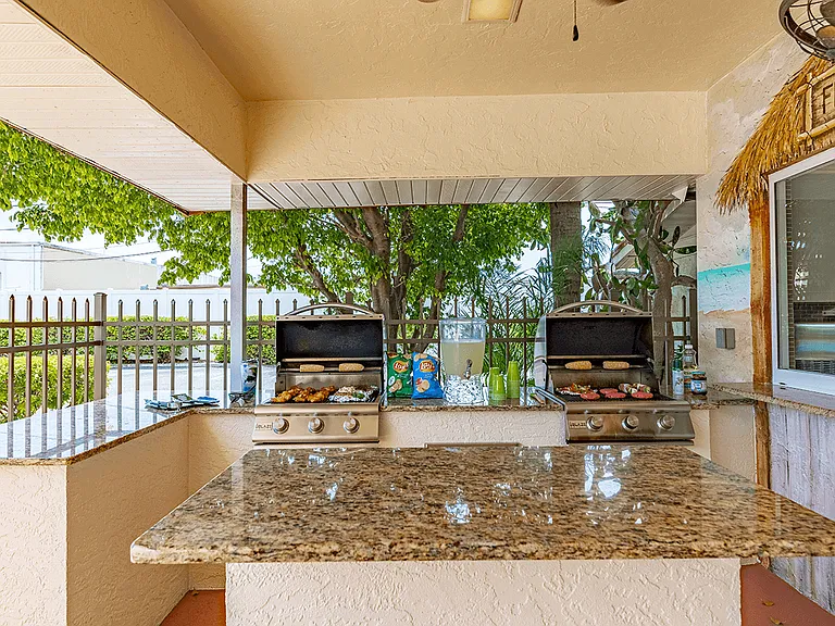 Outdoor kitchen with two grills
