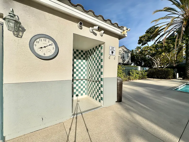Showers in community pool area.