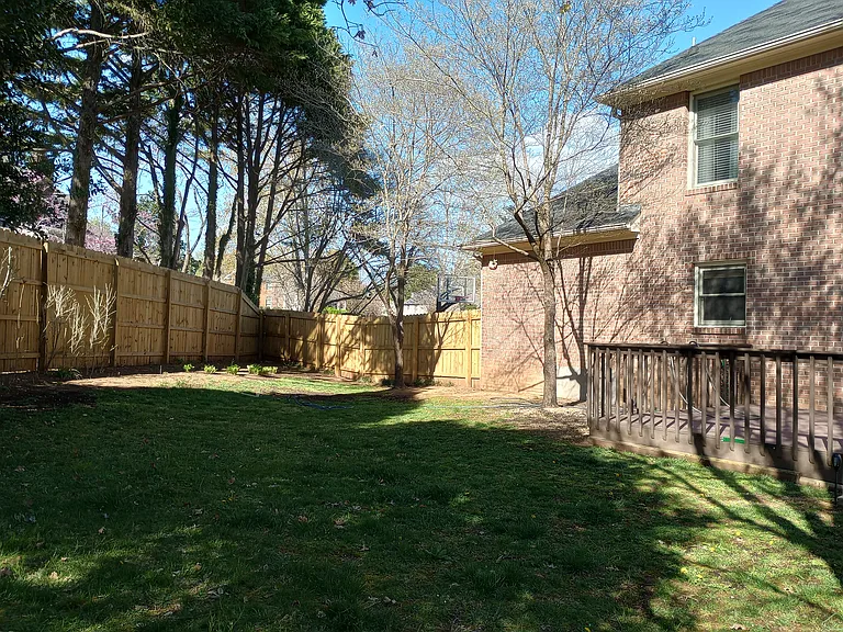 Back yard with 8ft and 10ft fence