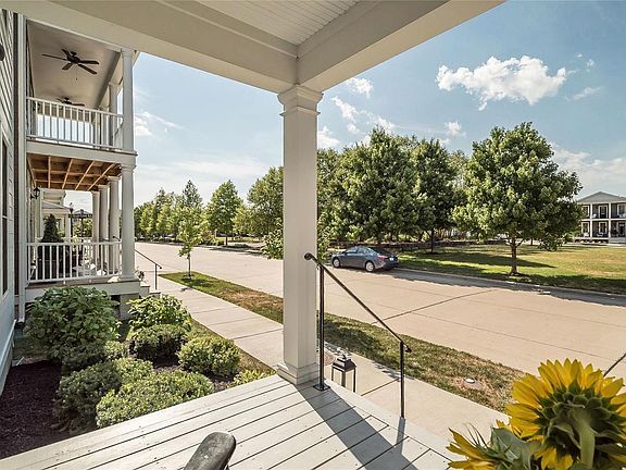 Looking across the street to one of the largest park areas in New Town. Plenty of room to play yard games with your friends and family!
