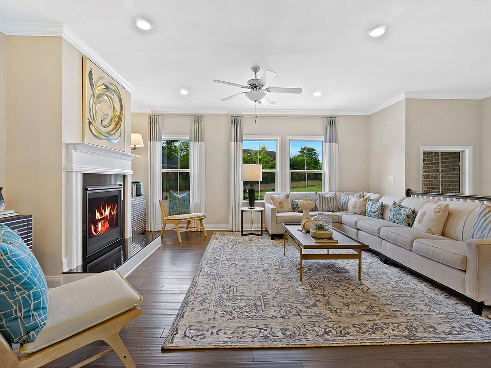 Large living area with gas fireplace.