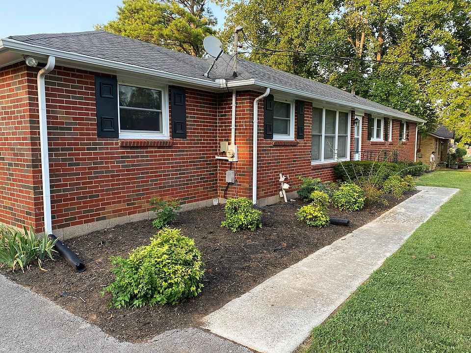 Nice clean landscaping in front of home.