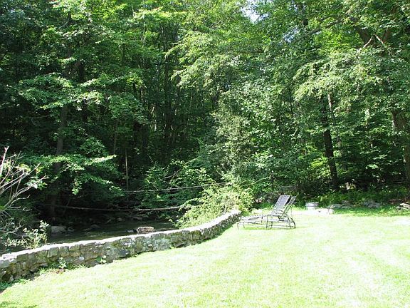 When the trees are in bloom... Relax by the riverside and enjoy the soothing sounds of nature.