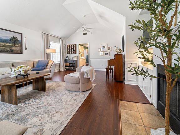 Living room/great room that can be divided into a dining room as well. This family has chosen to make it a great room with a coffee nook.