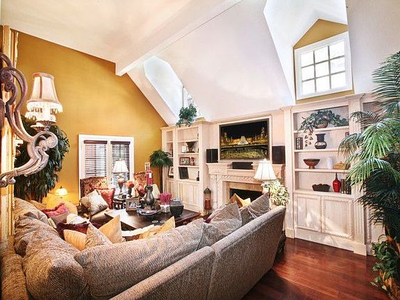 Family Room with hand carved mantle imported from England