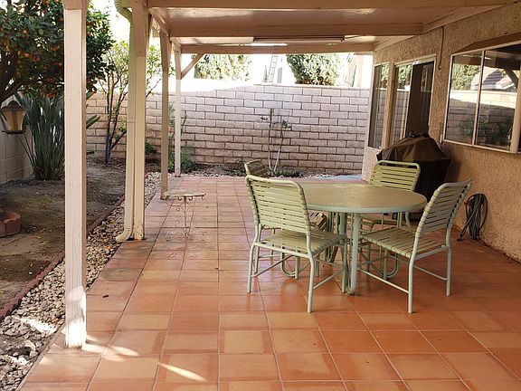 Perfect for entertaining. The kitchen bay window looks at a beautiful kumquat tree.