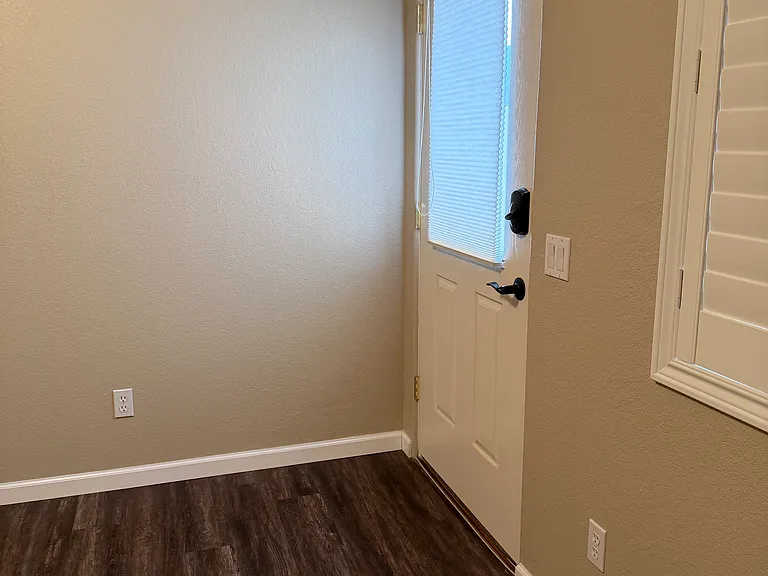 Bonus, private bedroom off primary suite with door to backyard