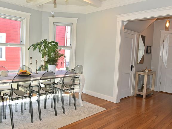 Entry foyer with spacious closet opens into dining area and kitchen.