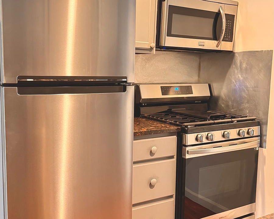 Stainless steel appliances and modern kitchen!