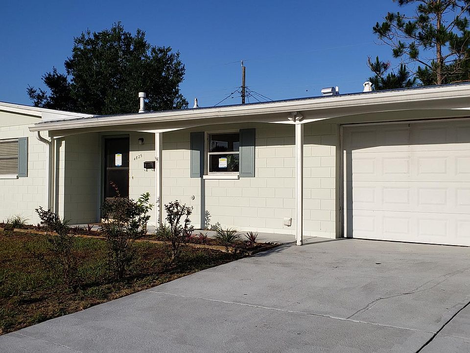 Cute mid-century modern design with newer roof.