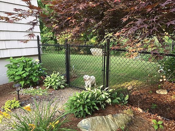 Side entrance to fenced back