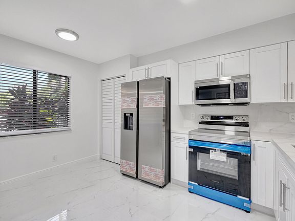 4th image of 7320 Amberly Lane #105