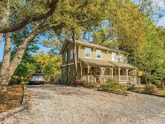 Facade of duplex with ample parking