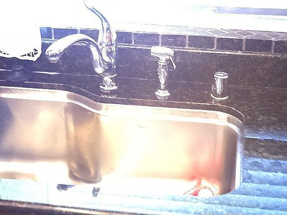 new large stainless sink and chrome faucet