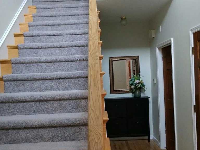 View of hall to family room from front entry.