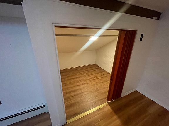 Closet in loft bedroom