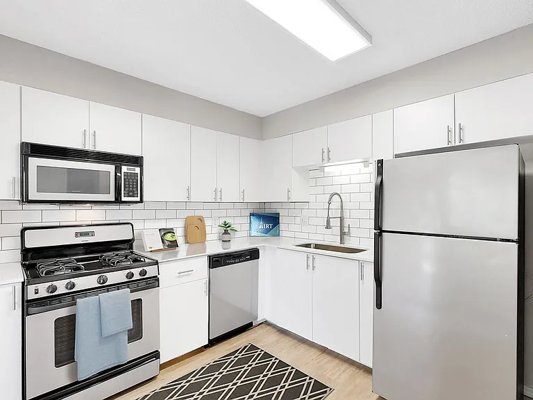 Tastefully renovated kitchen with stainless steel appliances Tastefully renovated kitchen with stainless steel appliances