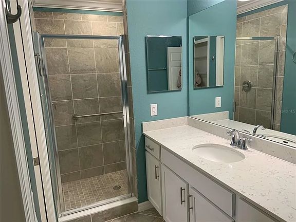 main bedroom bathroom with handrails