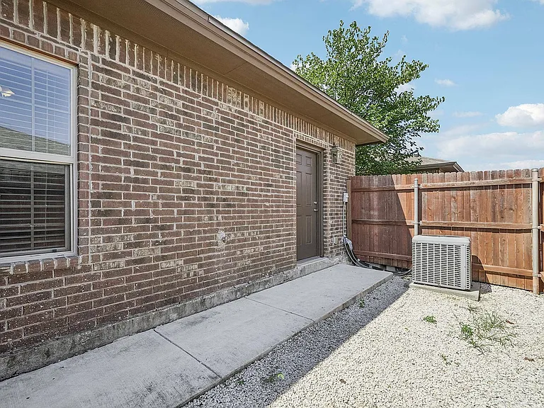 Enjoy your private outdoor space with a secure privacy fence at Arroyo Seco Villas in San Antonio.