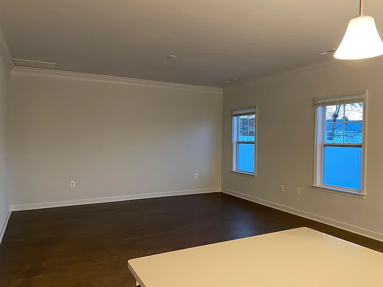 Family room with Hardwood floors