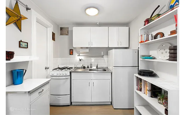 Sold by Douglas Elliman | media 11