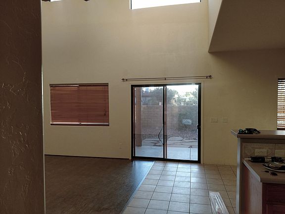 View of Kitchen/Dining/Living room from Front Entryway