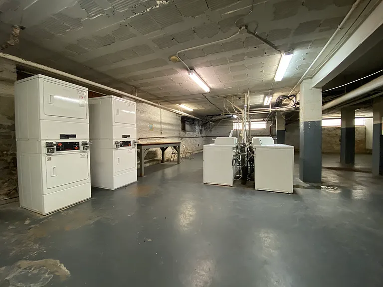 Large laundry room in basement.