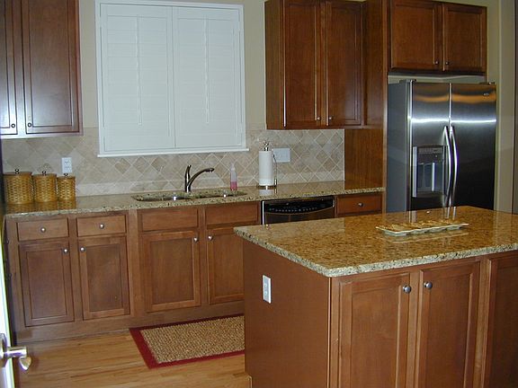 Kitchen w/ Slab Granite
