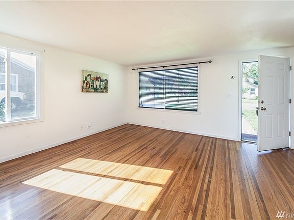 Bright living room with hardwood floors