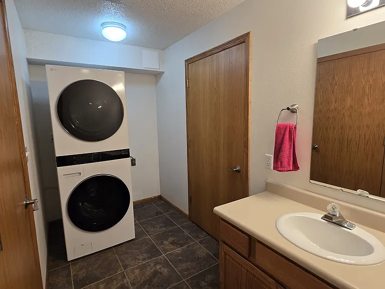 New washer/dryer in basement bathroom/laundry room