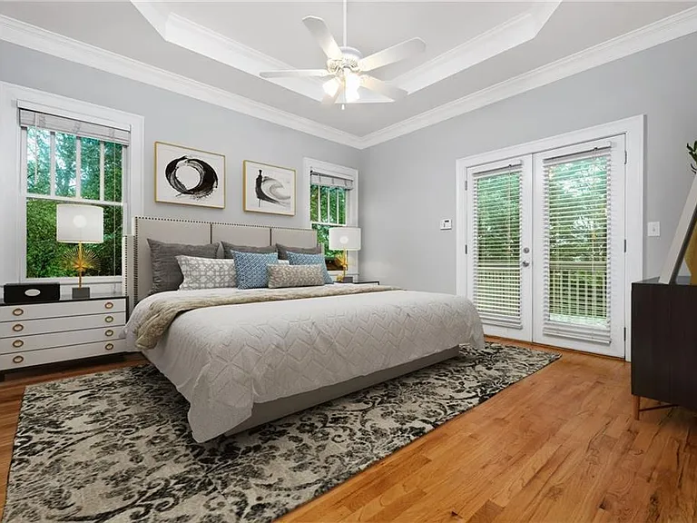 huge master bedroom with private en-suite bathroom and spa tub. Private entrance to back porch and yard.