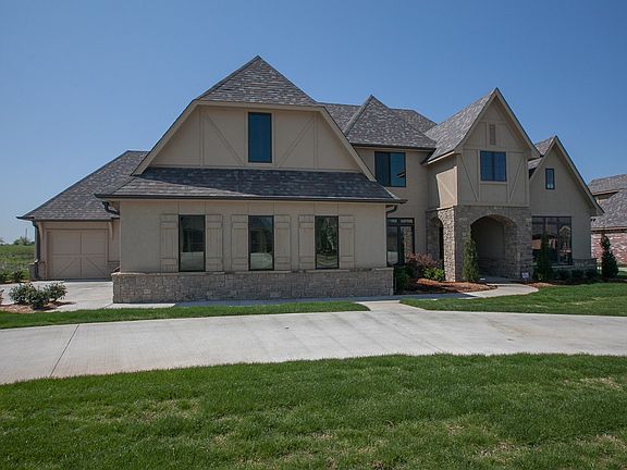 Side entry three car garage