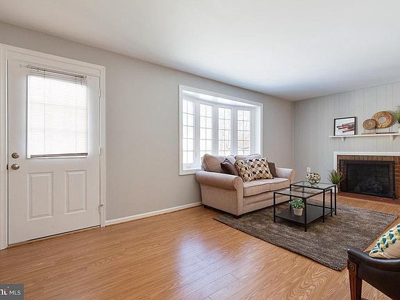 Light and bright living room with gas fireplace