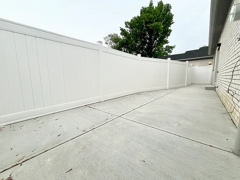Gated backyard with 6' vinyl privacy fence