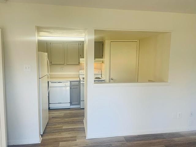 Living room looking into kitchen