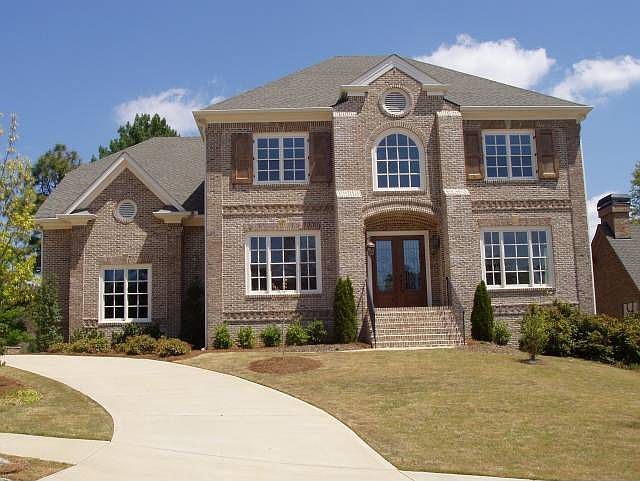 This 4-sided brick home has never been occupied!