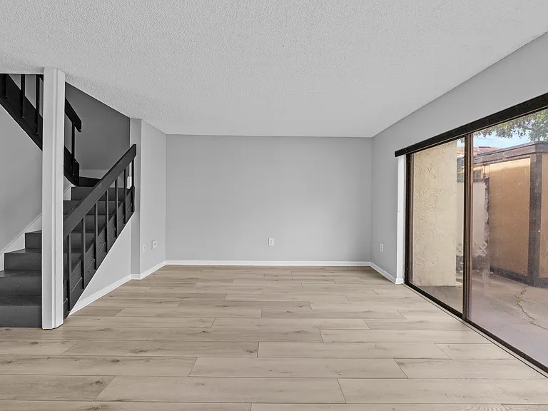 Living Room/Wooden Stairs to 2bed/2bath