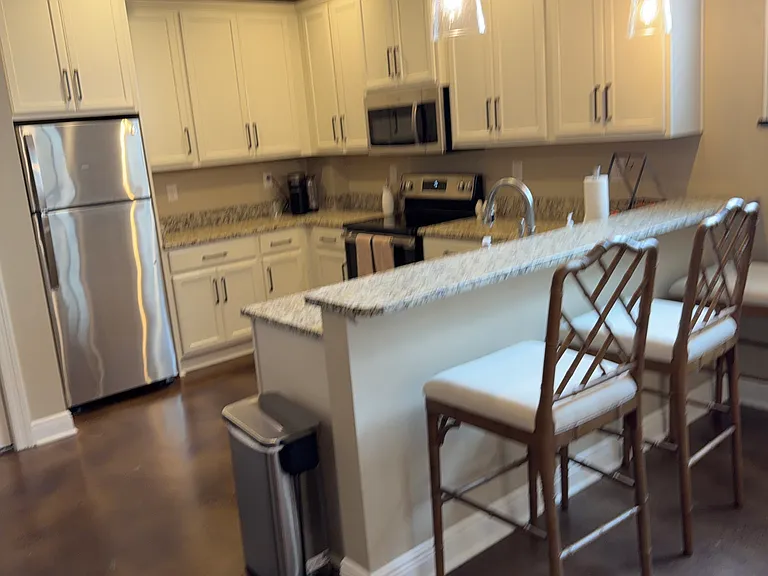 Kitchen with Three Bar Stools