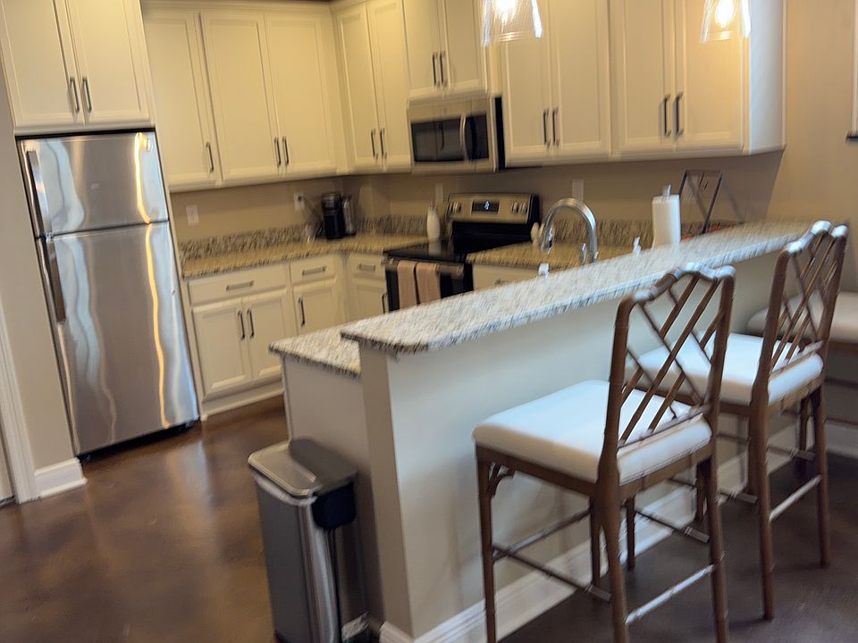 Kitchen with Three Bar Stools