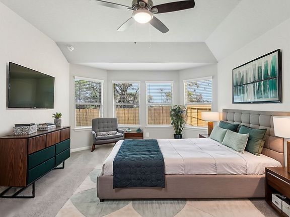 Virtually staged primary suite in Preston floorplan at a Meritage Homes community.