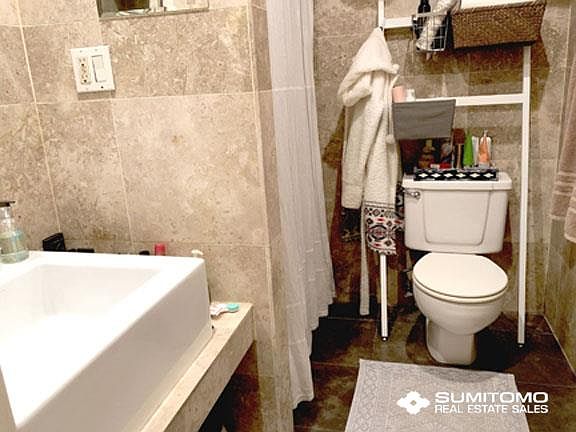 4th image of 214 E 9th St APT 2D