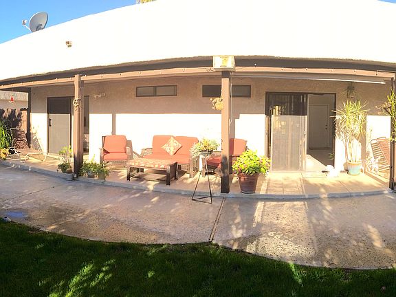 Beautiful and tranquil fenced backyard with mature shade tre