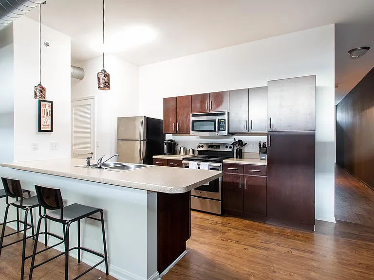 Huge Pantry Cabinet (right side of photo) provides great kitchen storage....